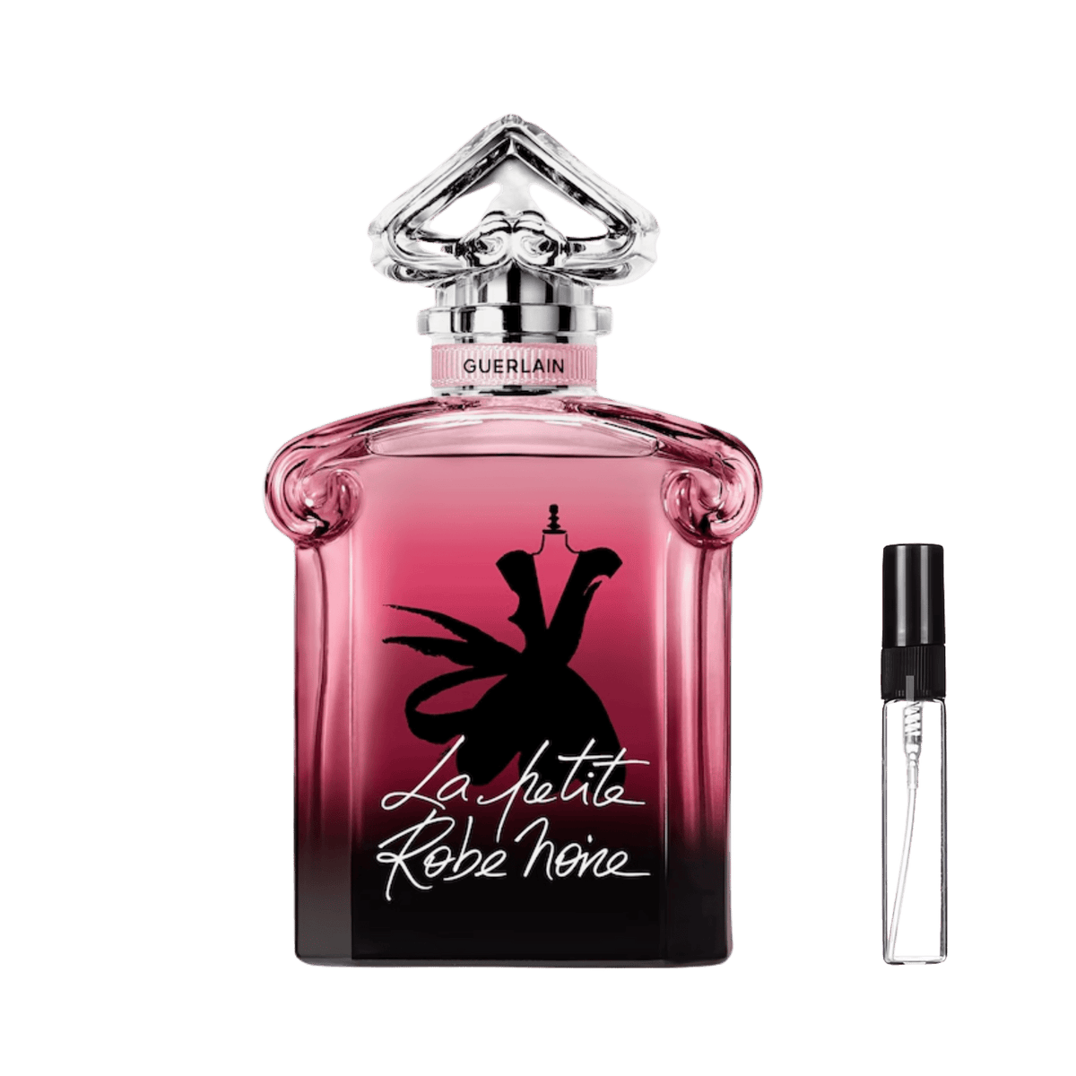 Różowy flakon Guerlain La Petite Robe Noire z czarną sukienką obok szklanej fiolki odlewki perfum – ODVARO.