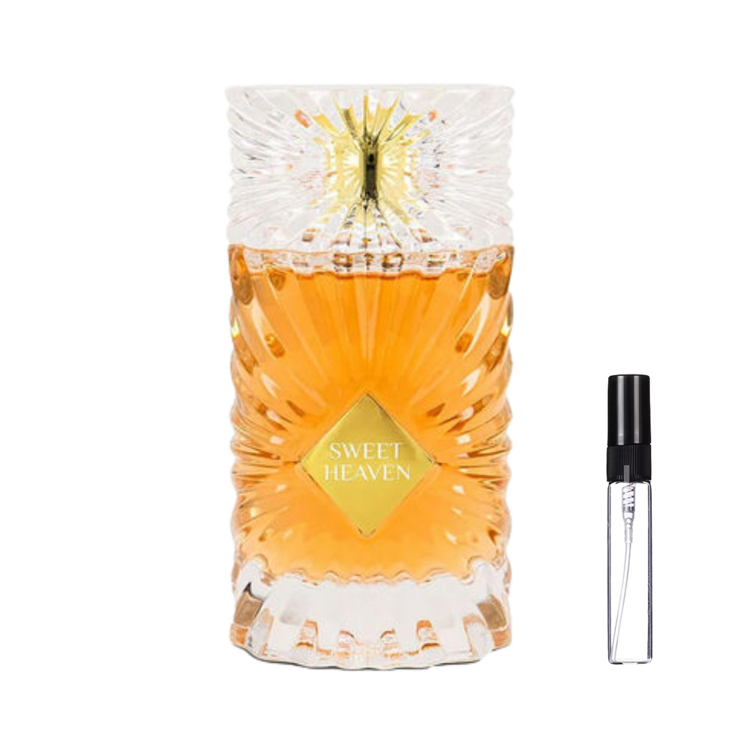 Kryształowy flakon Gulf Orchid Sweet Heaven z bursztynowym płynem obok szklanej fiolki odlewki perfum – ODVARO.