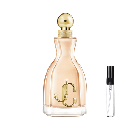 Elegancki flakon w kształcie klepsydry z brzoskwiniowym płynem, dużym złotym monogramem JC i kulistym korkiem oraz szklana fiolka odlewki na ulubiony zapach – ODVARO
